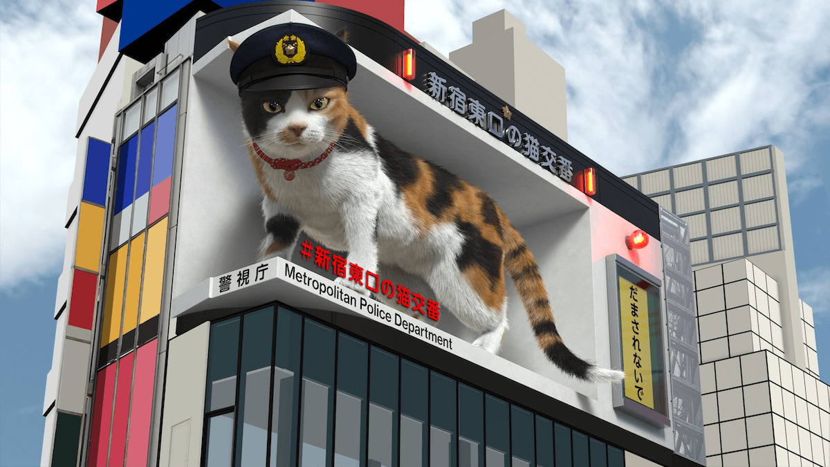 新宿駅東口の大型ビジョンに登場した巨大な三毛猫